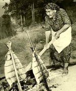 American Native woman smoking salmon.jpg