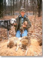 Teddy Moritz with a mini wire and lurcher, hunting partners who got a chuck and a coon..jpg